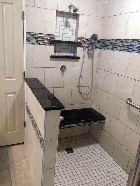 Accessible walk-in shower with built-in bench